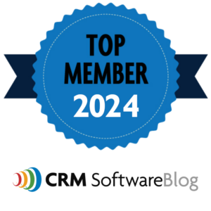 Blue cartoon ribbon with title "Top Member 2024" with the CRM SoftwareBlog logo underneath.